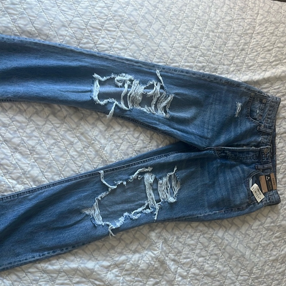 90s Baggy, Ripped Jeans.